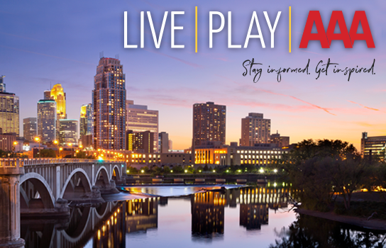 Minneapolis skyline at sunset - LIVE PLAY AAA - Official Publication of AAA Minneapolis