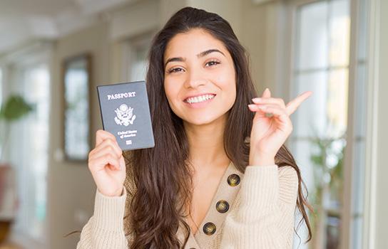 Woman holding a United States Passport