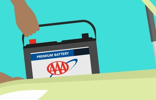 AAA car battery being installed by roadside assistance in Minneapolis MN