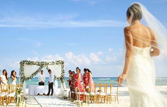 Destination wedding ceremony on an ocean beach