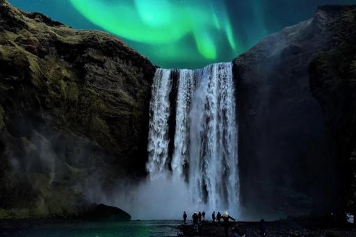 Northern Lights over a Waterfall in Iceland