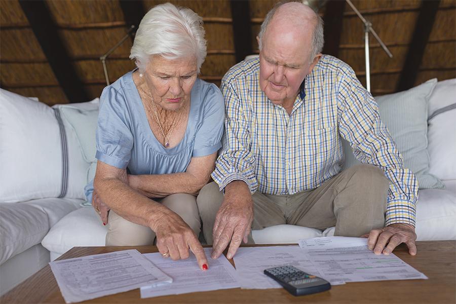 Senior Couple looking over documents