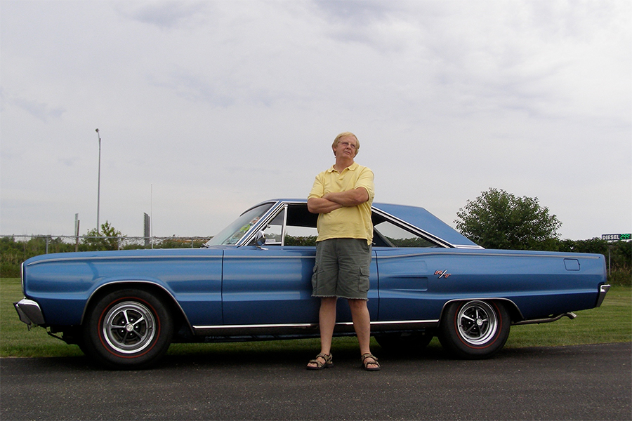 AAA member Larry posing with his 1967 Dodge Coronet