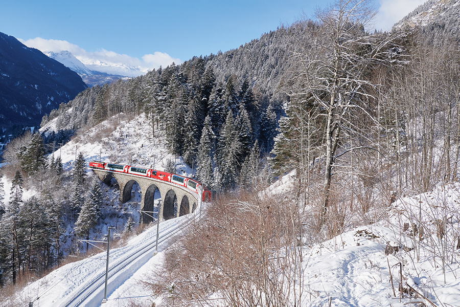 Glacier Express Rail Train on Snowy Mountainside